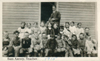 A Class photo in 1915 of a one room school house in Saskatchewan with Sam Axenty as the school teacherFOX HILLS School District # 190.1910 Organised. 1912 Classes.SW of SE 14 Township 24 Range 16 W of the 2 nd Meridiannear Fox Hills P.O. SE Section 14 Tsp 24 Rge 16 W2province of Saskatchewan, Canada  